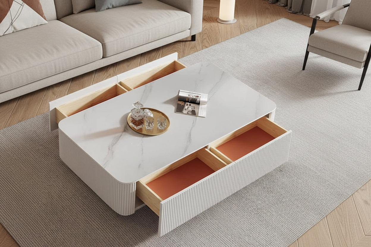 Modern coffee table with marble top and wooden drawers in a living room setting.