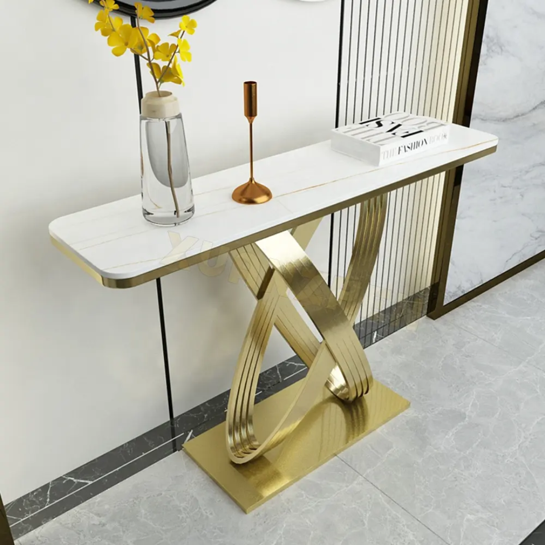 Decorative console table with marble top and gold base in a stylish living room.