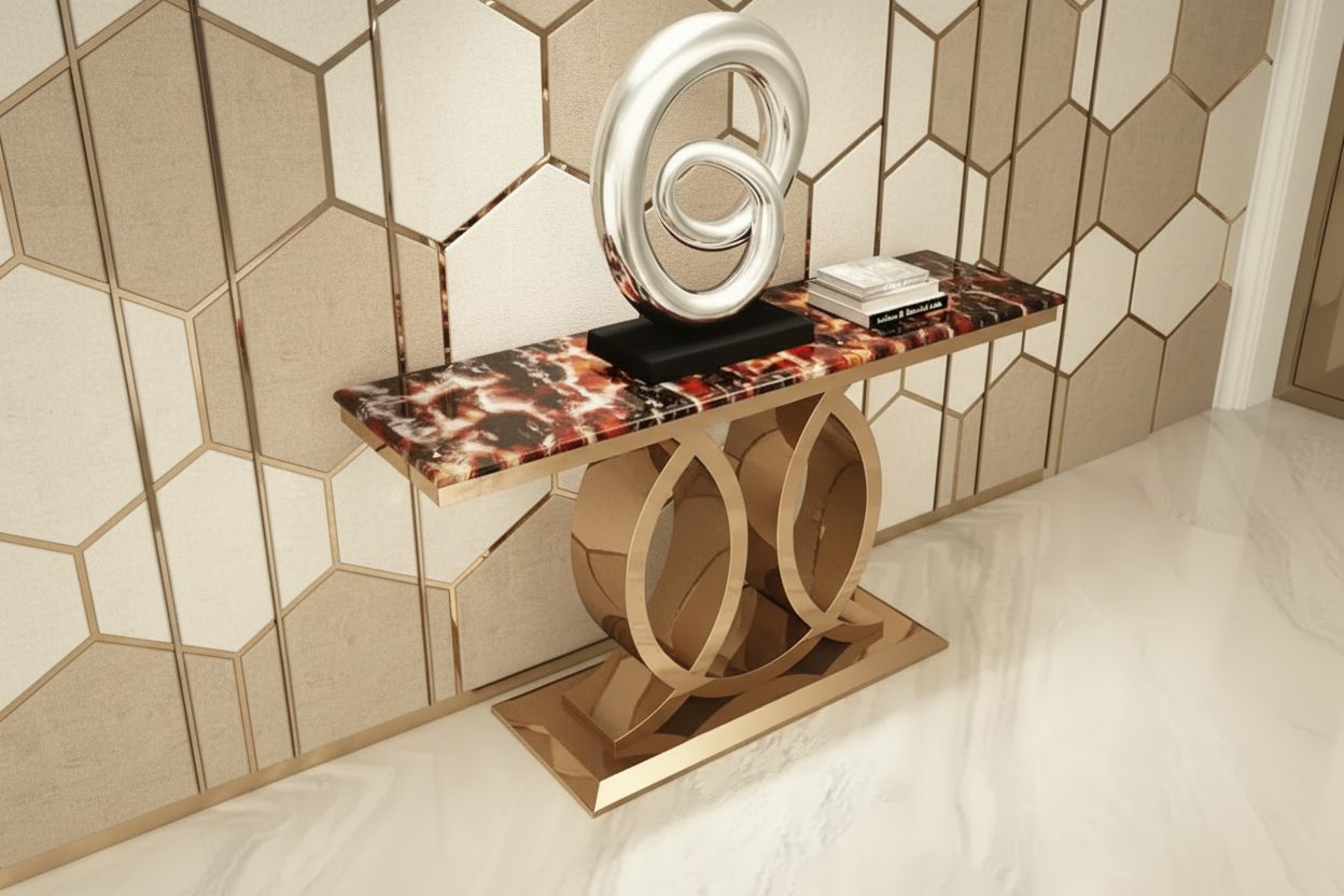 Decorative console table with marble top and gold base against a white wall.