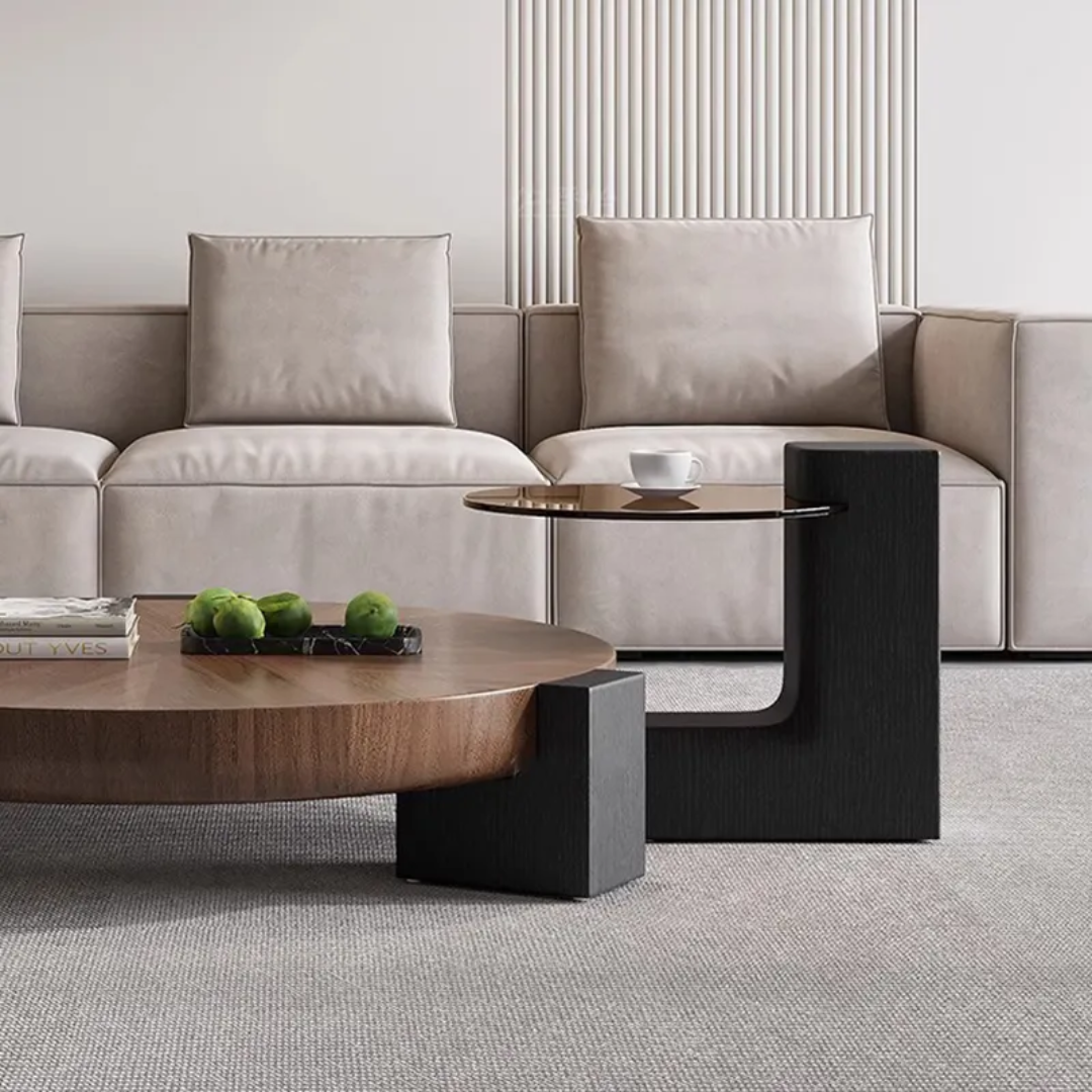 Modern living room with a beige sectional sofa, wooden coffee table, and decorative items.
