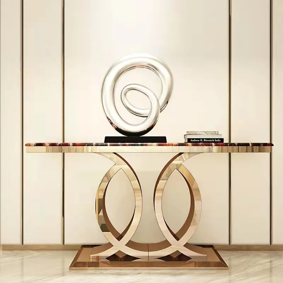 Decorative console table with a spiral sculpture on a neutral background