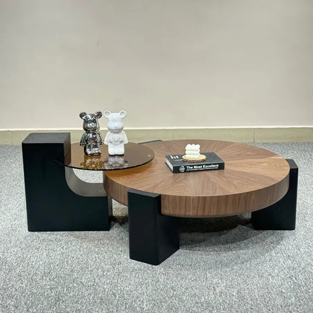 Modern coffee table with decorative items on a neutral background