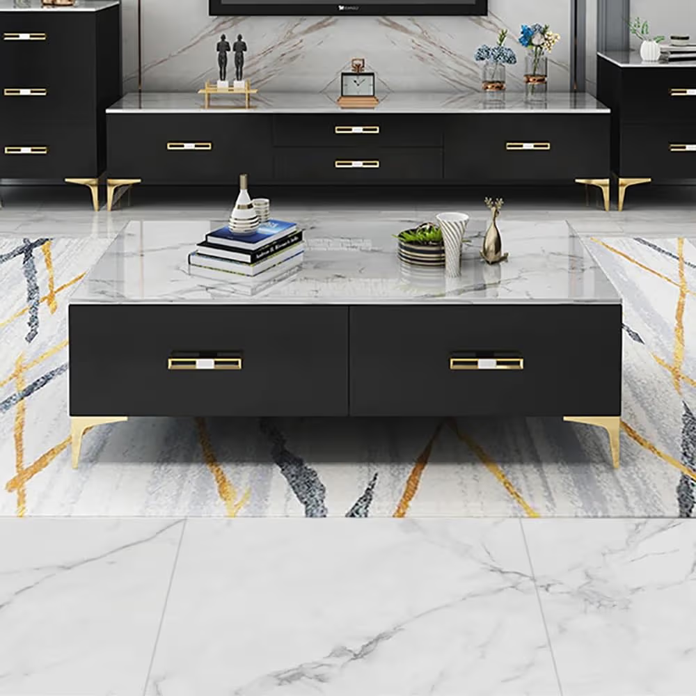 Modern black coffee table with marble design in a living room setting.