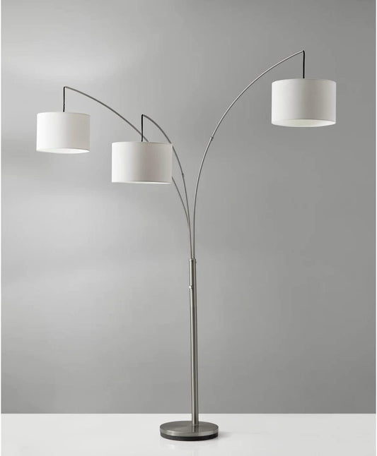 Modern standing floor lamp with three white shades and a sleek silver base for stylish home decor