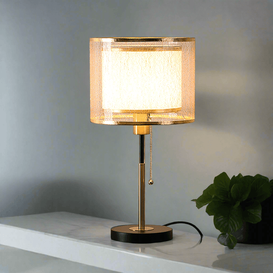 Elegant N I CREATIONS table lamp with a gold and white shade for modern home decor