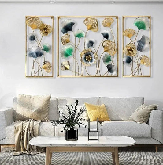 Metal wall art set of 3 – flower leaf design hung in modern living room
