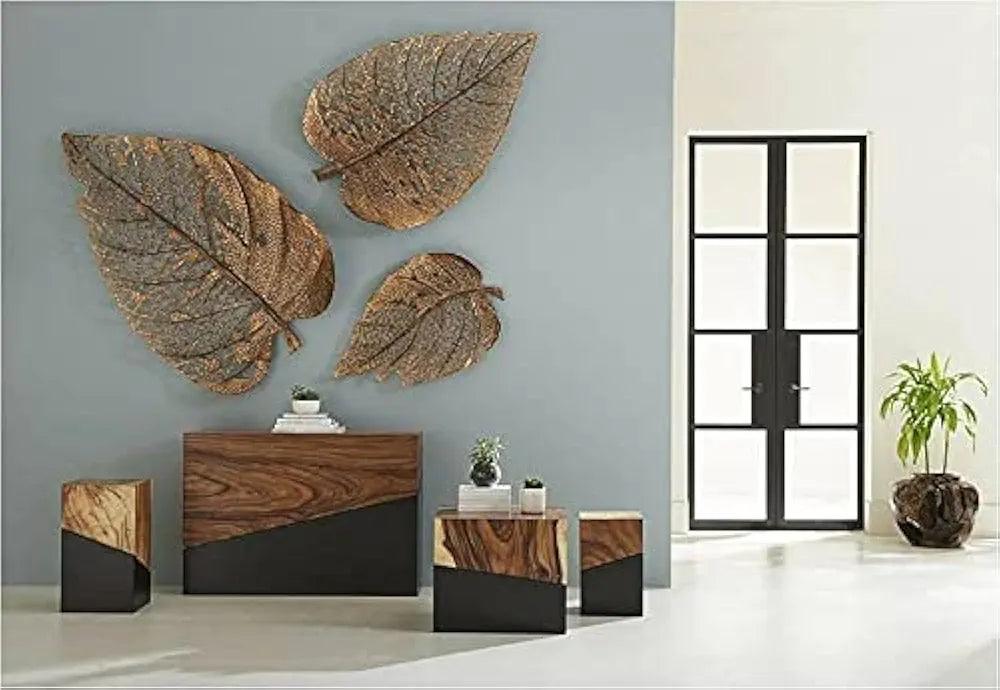 Decorative metal leaf wall art set of 3 hung on living room wall – copper bronze finish