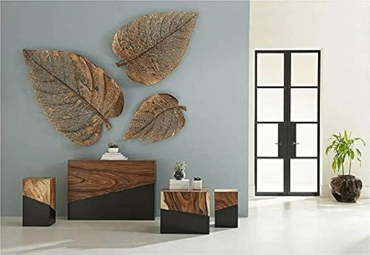 Decorative metal leaf wall art set of 3 hung on living room wall – copper bronze finish
