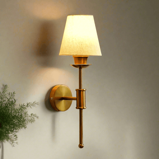 Elegant N I CREATIONS wall lamp with a textured shade and gold finish for stylish home decor