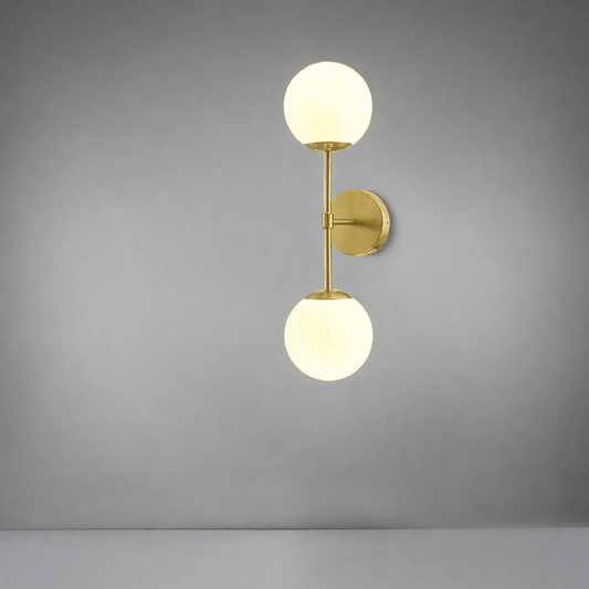 N I CREATIONS elegant wall lamp with two round glass shades and a gold finish