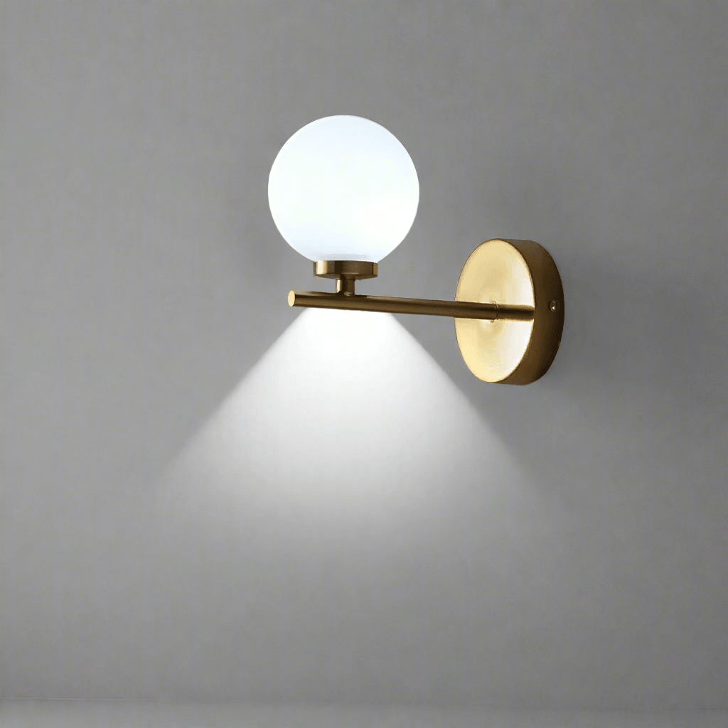 Modern minimalist gold wall lamp on clean grey wall