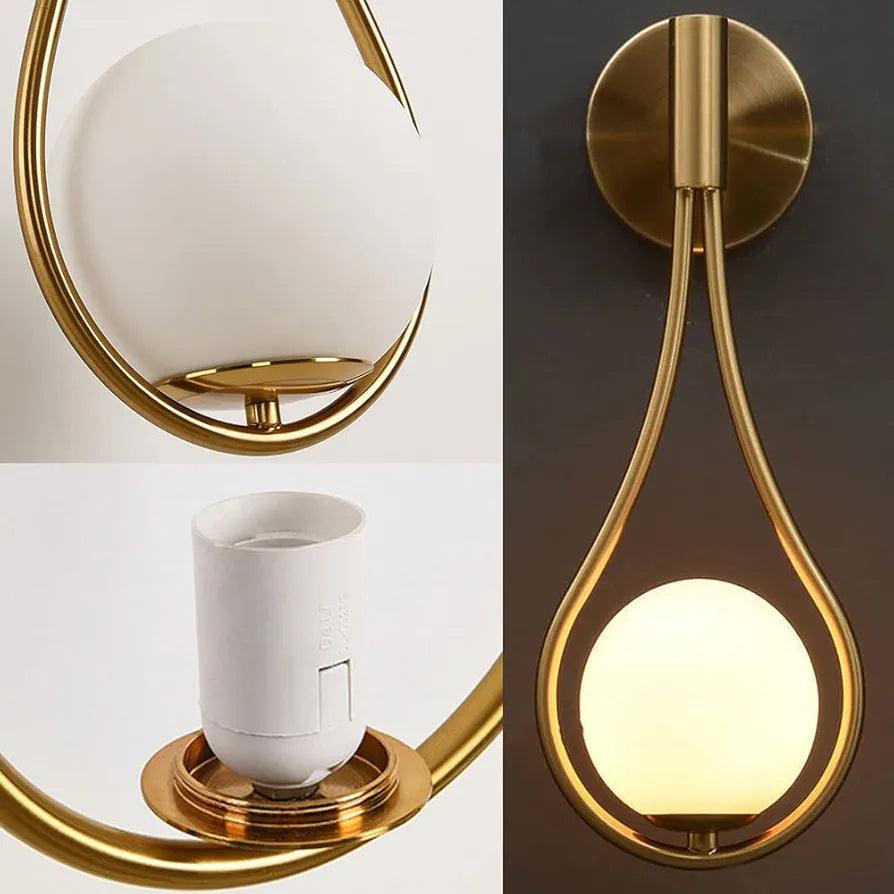 N I CREATIONS modern wall lamp with a stylish gold design and a round white glass shade