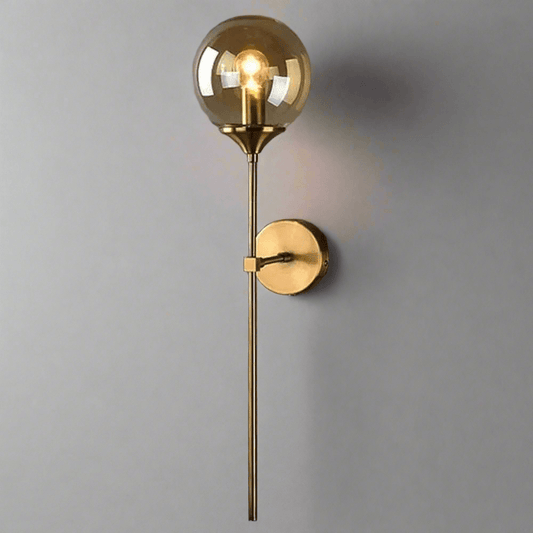 Elegant N I CREATIONS wall light with a gold finish and clear globe design for modern home decor