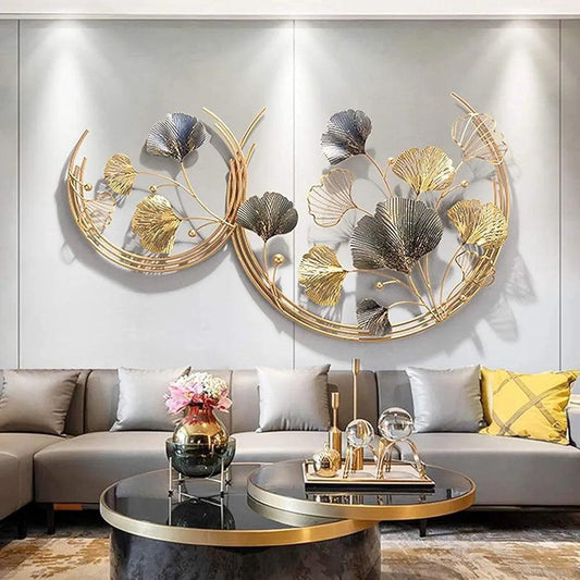 Gold and silver wall sculptures featuring elegant leaves, perfect for modern home decor