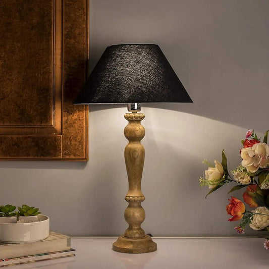 Stylish wooden table lamp with a black shade, perfect for home decor and indoor lighting